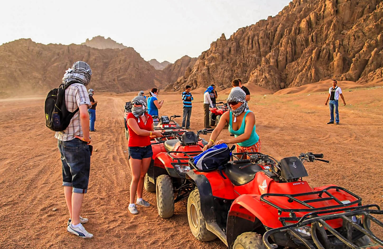 A group of people preparing to ride a quad bike from one of the safari trips in Hurghada