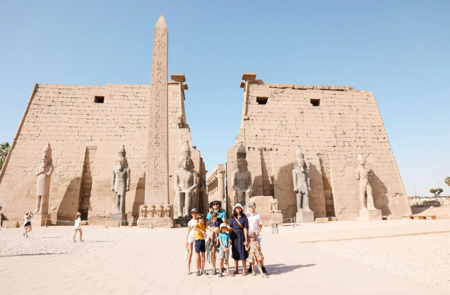 Family standing in front of Luxor Temple