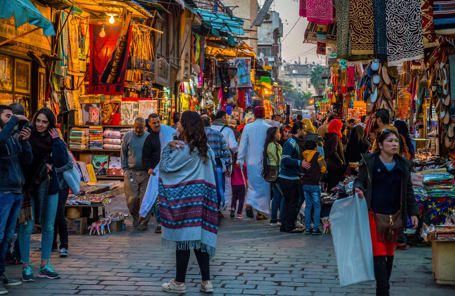 People walking along a street in Khan El Khalili market