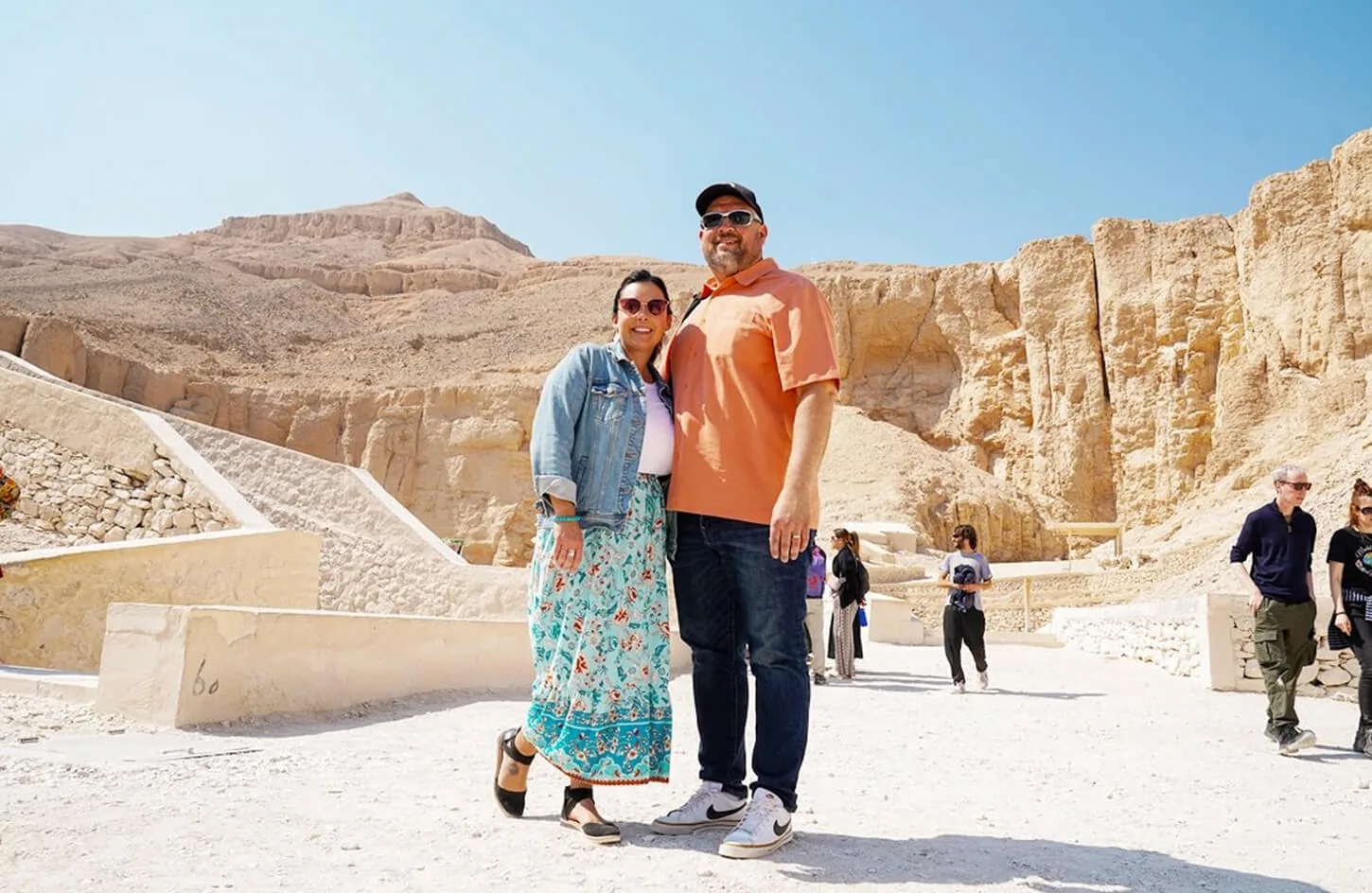 The couple in front of the Valley of the Kings outside