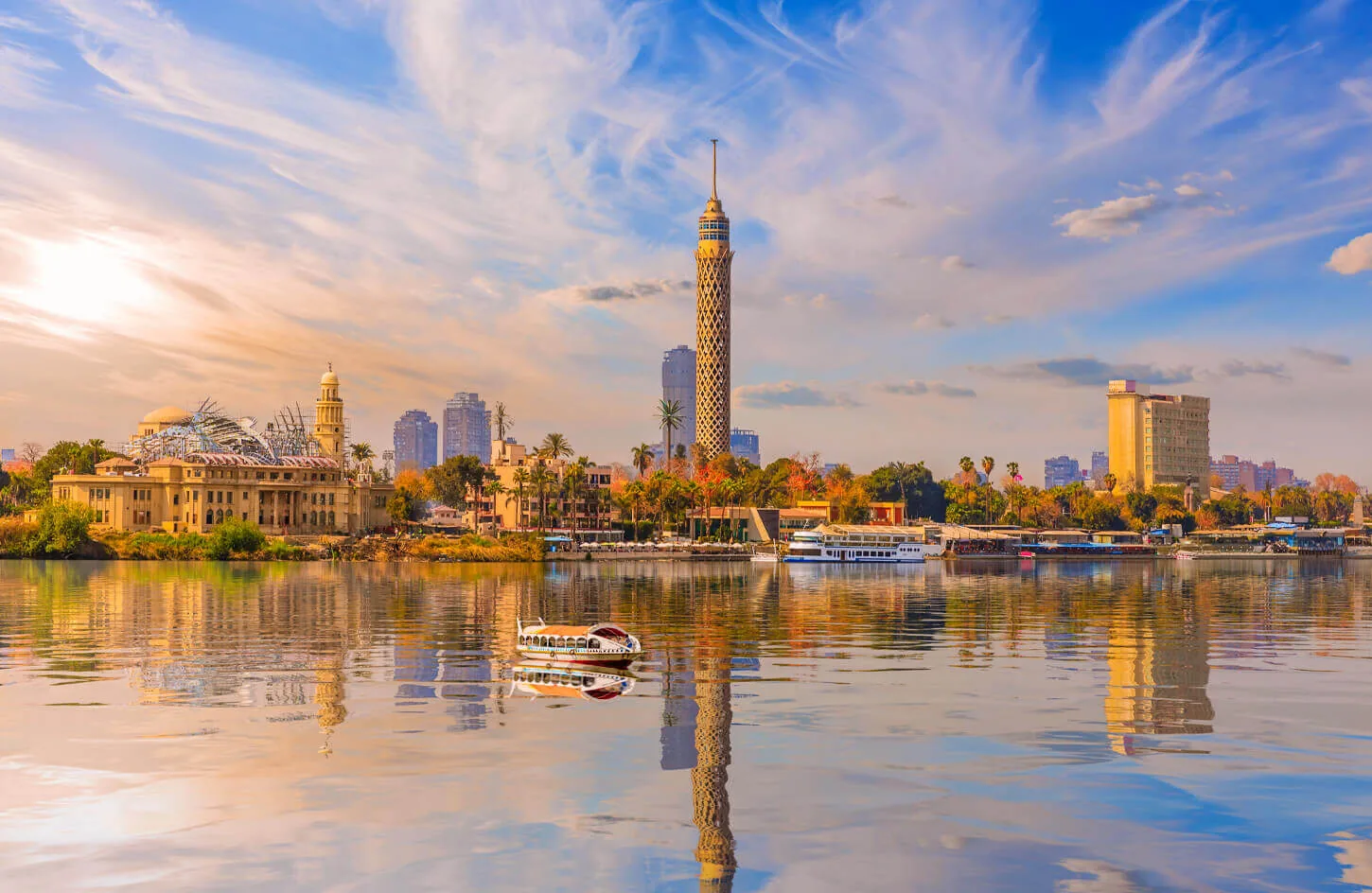 Cairo Tower with its reflection on the Nile River