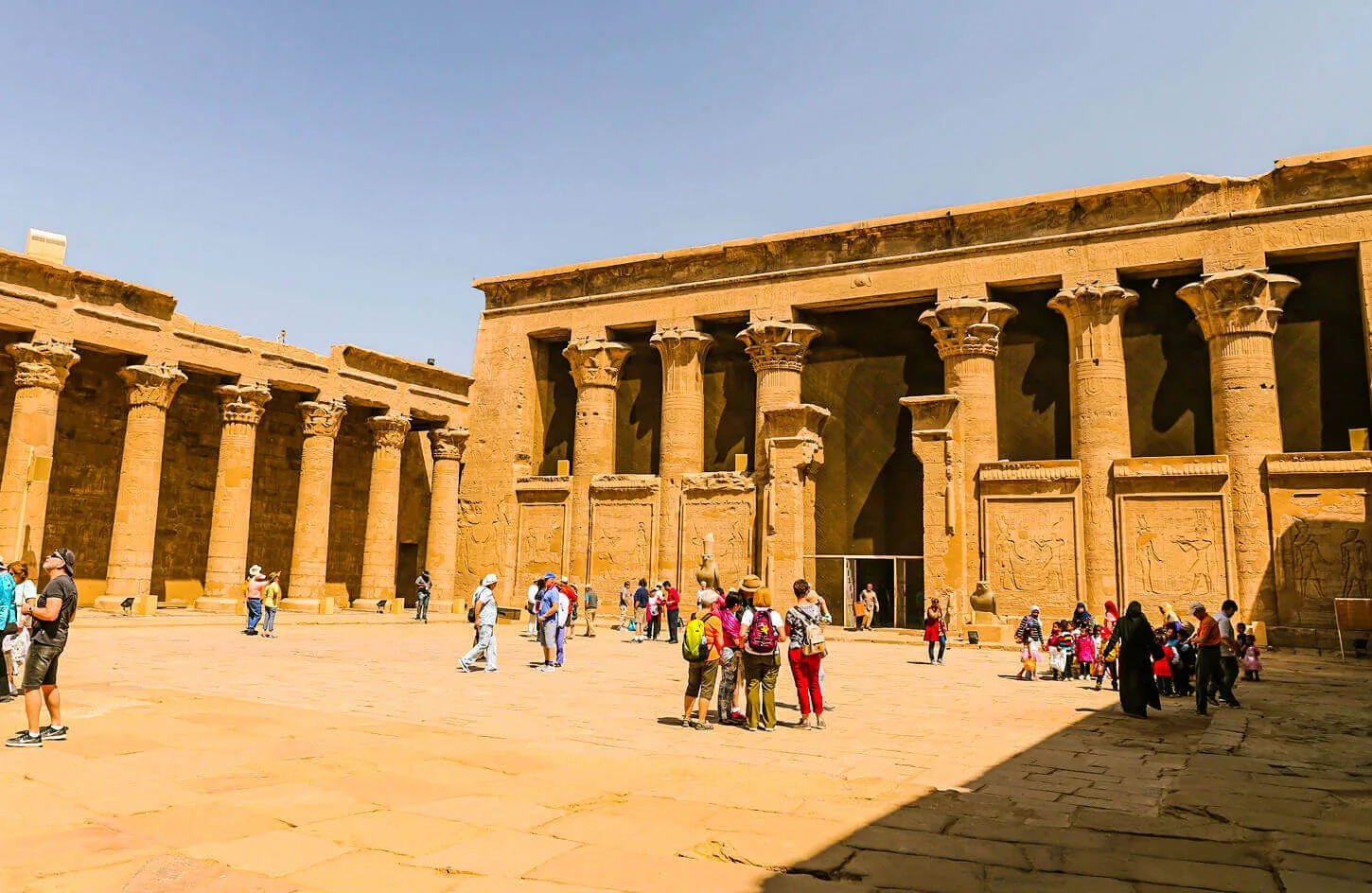 Some tourists in front of the Edfu Temple from one of the excursions