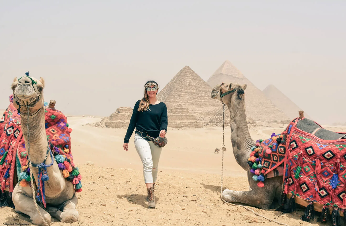 Woman with a camel at the Giza Pyramids