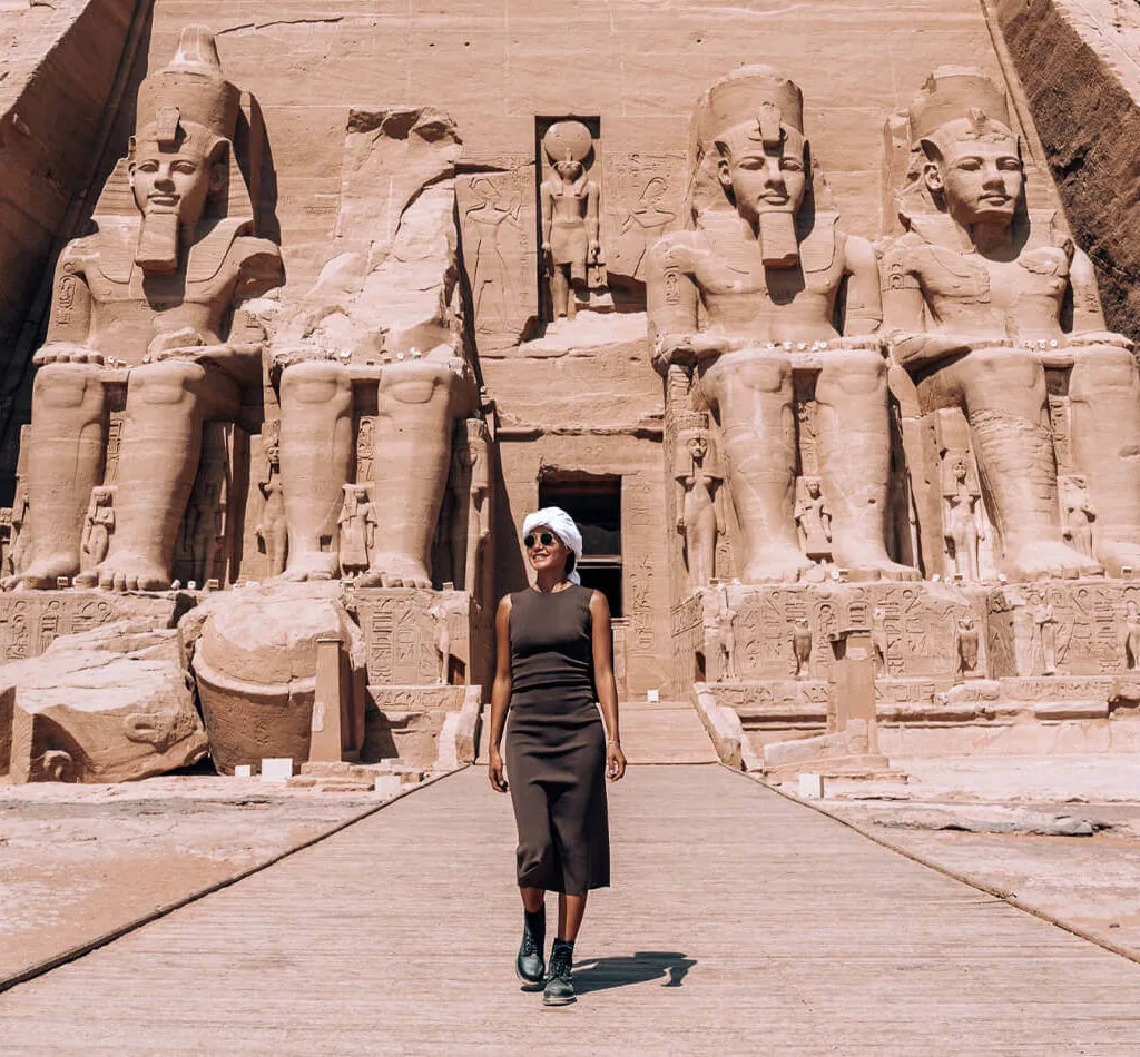 Woman standing in front of Abu Simbel Temple